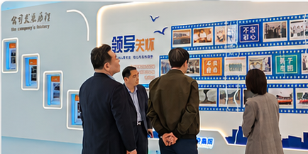 Visitors learning about the company during a corporate visit
