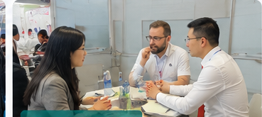 Face-to-face customer meeting at a medical exhibition